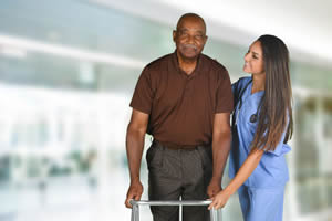 Elderly man with a caregiver; How Do Medicaid Rules Differ For Home Care?